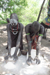 Mursi Women Grinding Flower